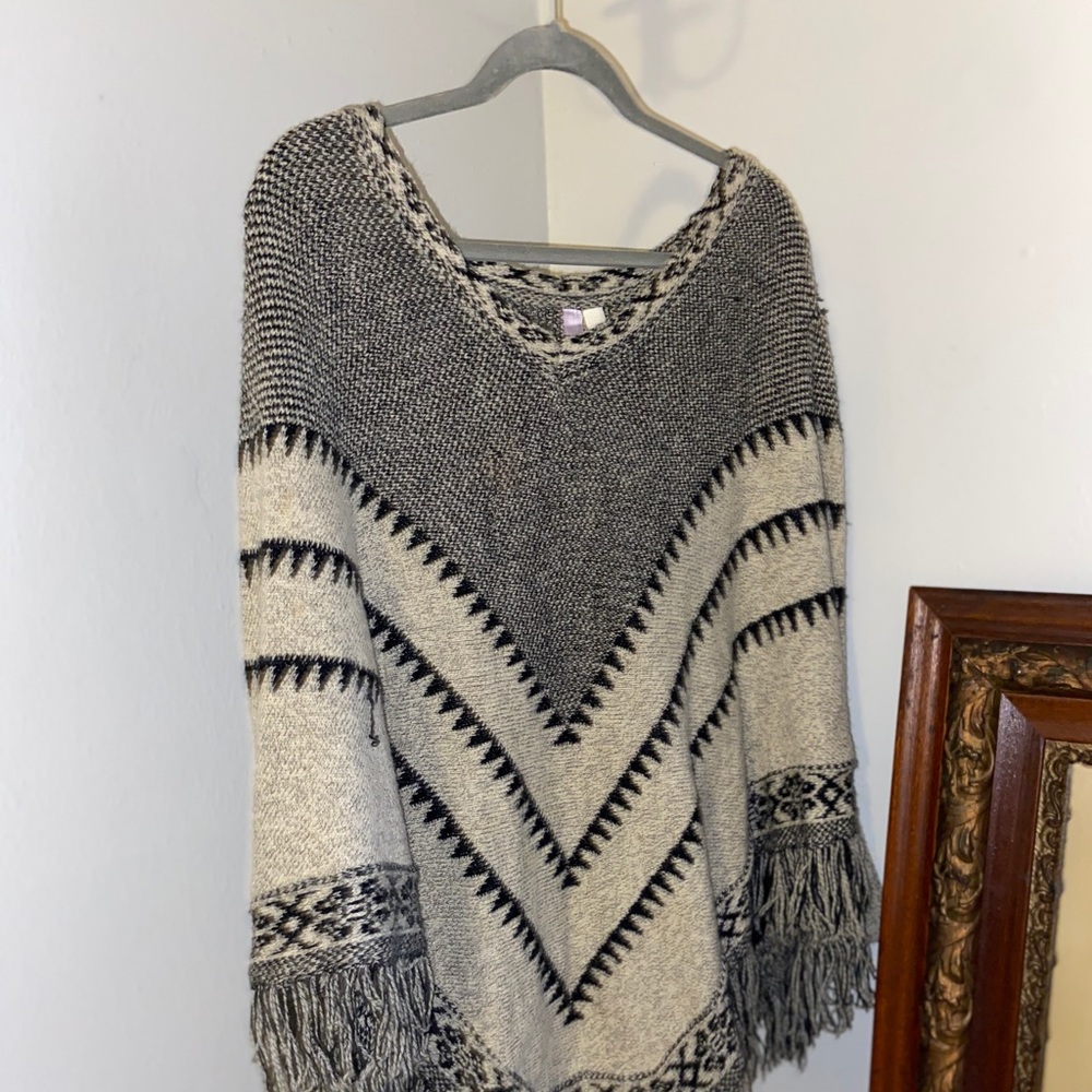 Knitted black and beige pancho type sweater
